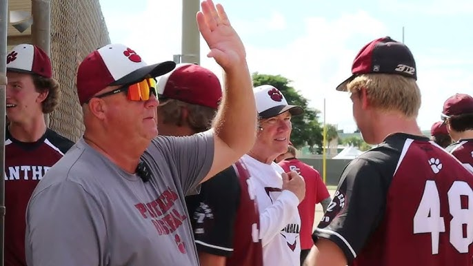 Coach high-fiving player